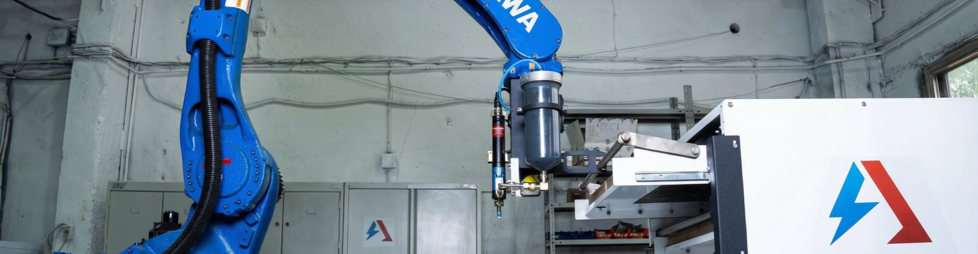 Роботизированный комплекс нанесения уплотнений на базе робота YASKAWA